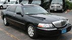 Black sedan town cars